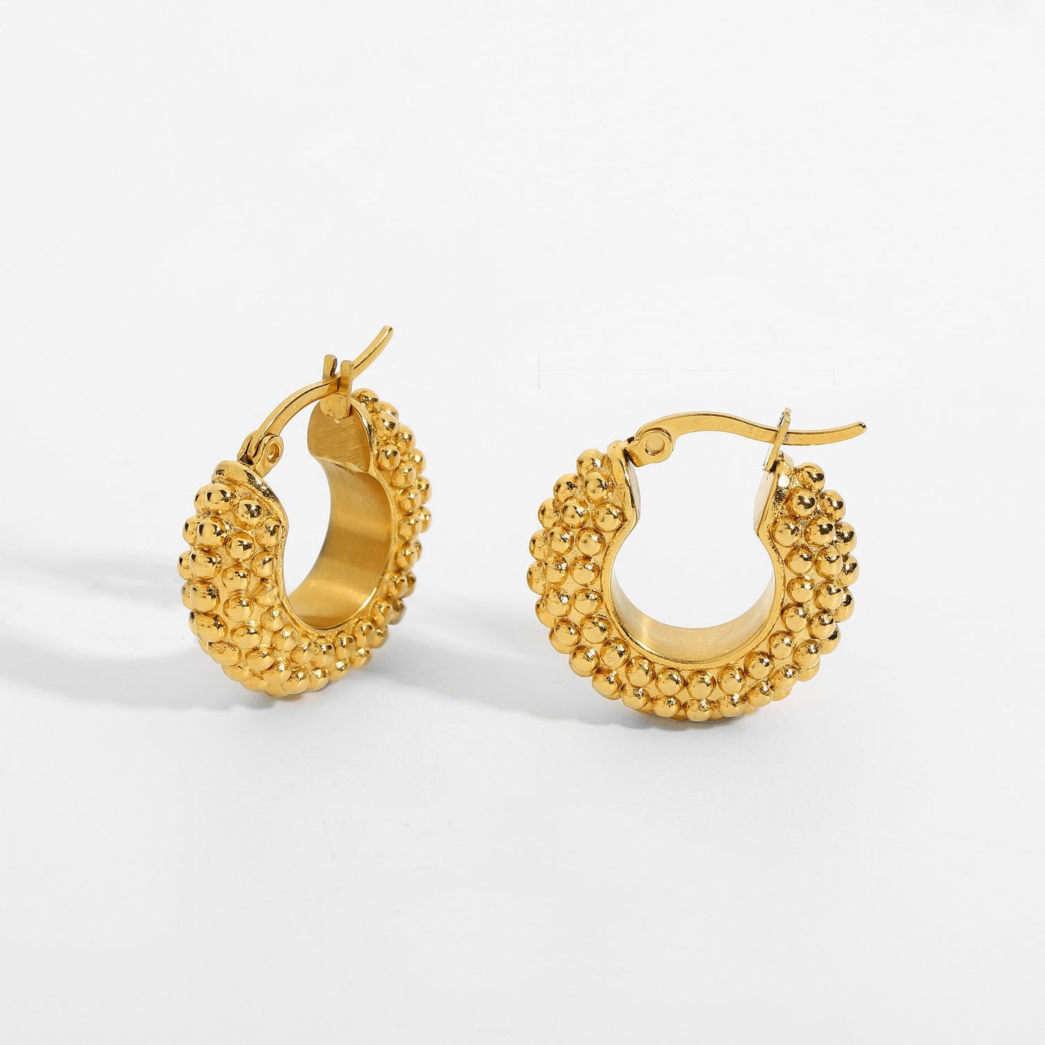 Gold plated earing